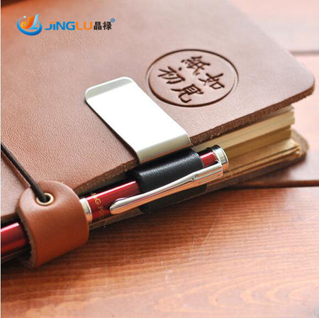 Clip stylo pour note book